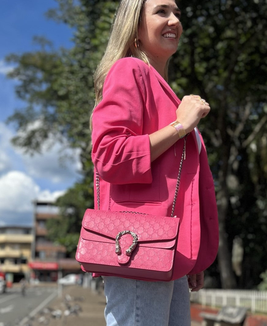 BOLSO  HERRADURA FUCSIA