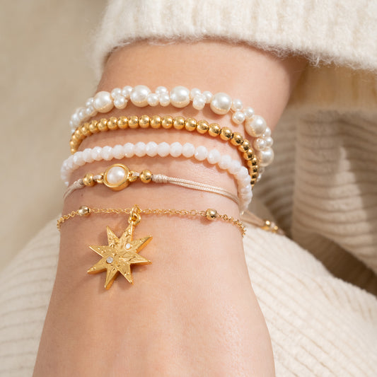 SET DE PULSERAS CON PERLAS Y ESTRELLAS